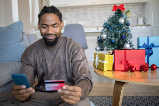 istock Man celebrating Christmas Eve at home 1439817229