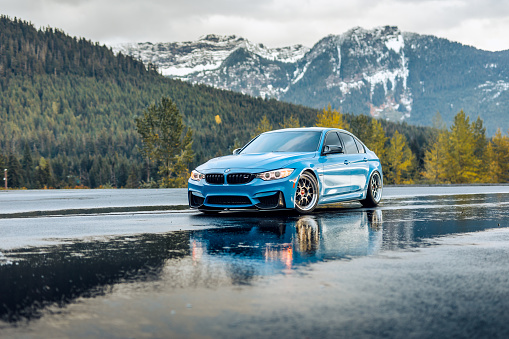 Snoqualmie, WA, USA\n11/5/2022\nBlue BMW M3 driving on the road