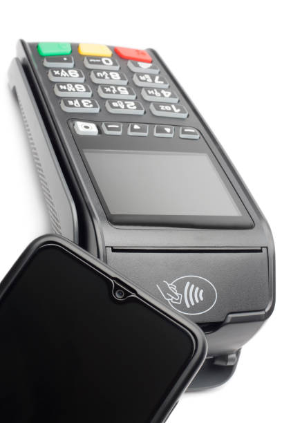 istock POS terminal mobile phone payment NFC technology isolated on white background 1439822086