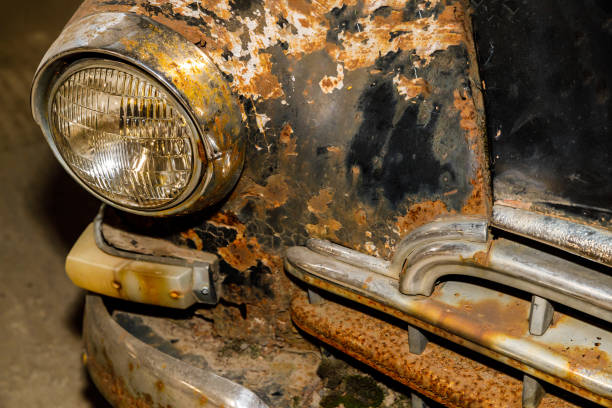 istock old rusty retro car of black color. 1439823106
