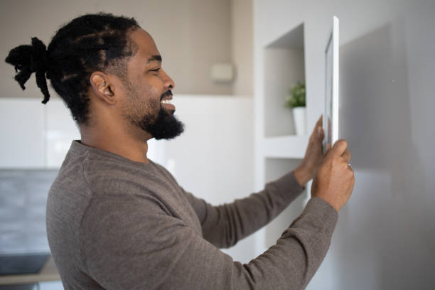 istock Young man moves into a new apartment 1439823234