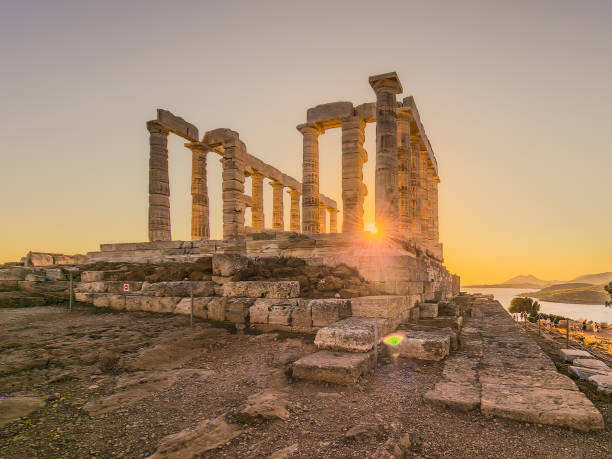 istock Sun Peeking Through Columns of Temple 1439824490