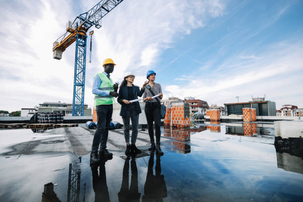 pracowników na plac budowy - architect construction hardhat planning zdjęcia i obrazy z banku zdjęć