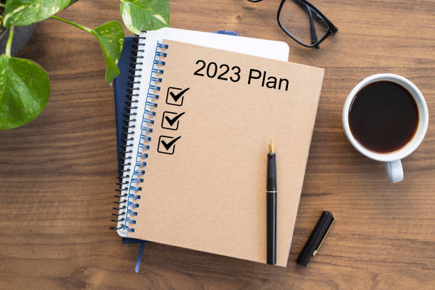 istock Note book with 2023 goals text on it to apply new year resolutions and plan. 1439827774