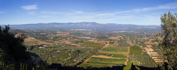 View from Montsianell near Amposta looking towards Santa Barbara, Masdenverge, Tortosa, Els Ports, and Mont Caro in Catalonia, Spain stock photo