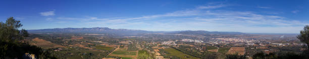 View from Montsianell looking towards Amposta, Santa Barbara, Masdenverge, Tortosa, Els Ports, Mont Caro, and the Ebro Delta in Catalonia, Spain stock photo