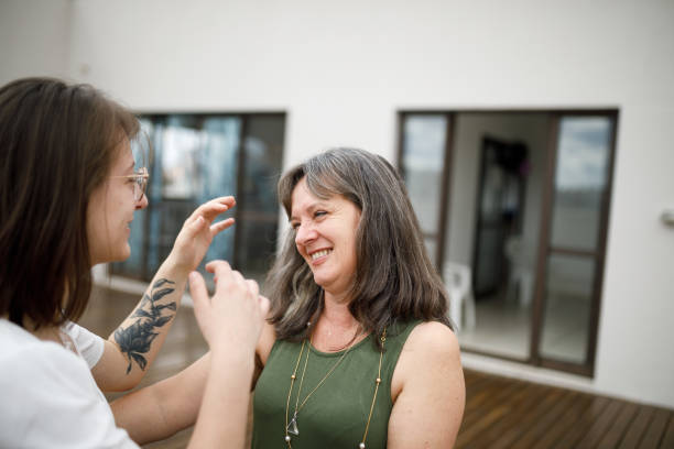 istock Mother looking affectionately to her daughter 1439832496
