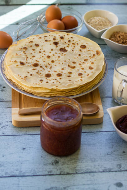 istock Ingredients for pancakes and thin pancakes 1439835403