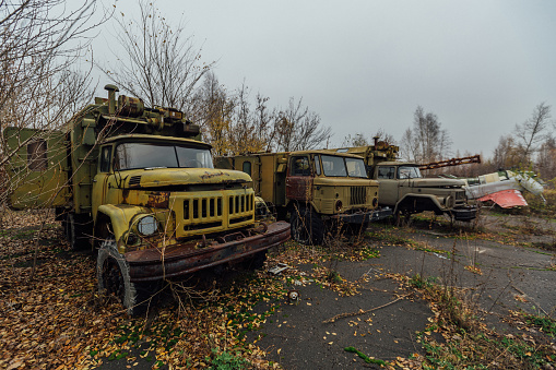 Old abandoned rusty military trucks