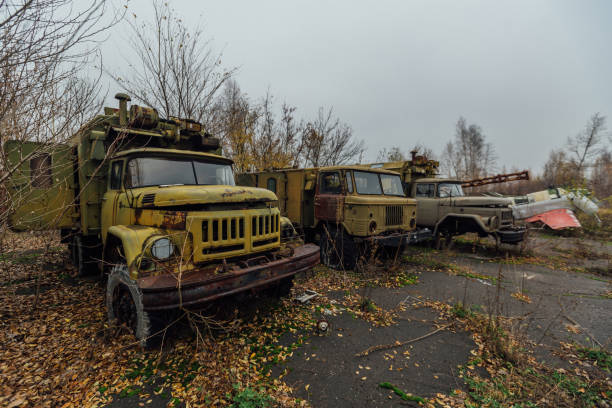 old abandoned rusty military trucks - mlrs imagens e fotografias de stock