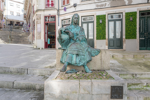 Coimbra, Portugal - Feb 11, 2020: Tricana Statue  (Tricana de Coimbra) - Coimbra, Portugal