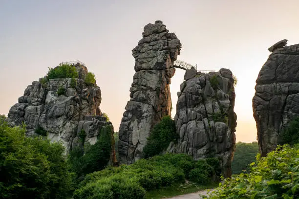 The iconic Externsteine rock formation against the early morning sky, Teutoburg Forest, Germany