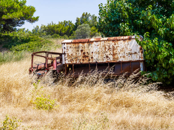Old rusty abandoned damaged truck