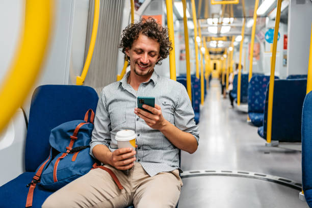 istock Young Man Using Phone In A Subway Train In Stockholm 1439846291