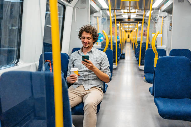 istock Young Man Using Phone In A Subway Train In Stockholm 1439846331