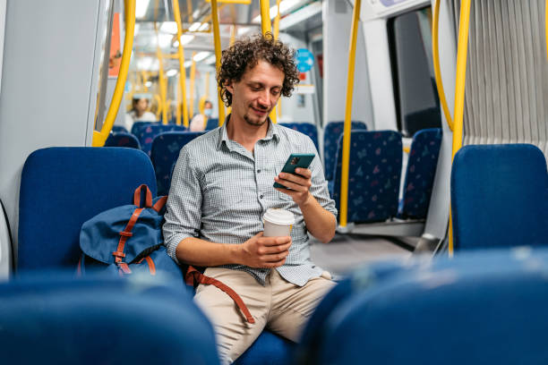 istock Young Man Using Phone In A Subway Train In Stockholm 1439846513