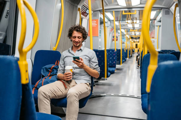 istock Young Man Using Phone In A Subway Train In Stockholm 1439846647