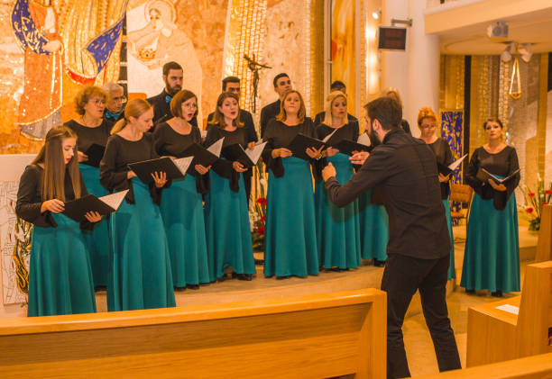 istock The musical conductor leads the choir during the performance 1439848306