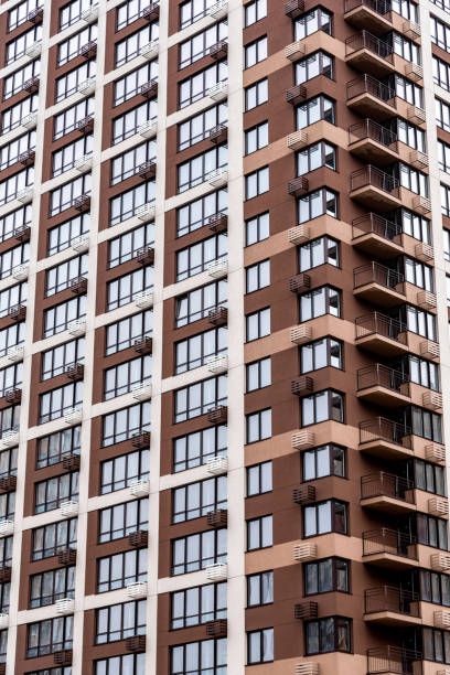 istock Multi storey modern new brown residential building close up 1439857767
