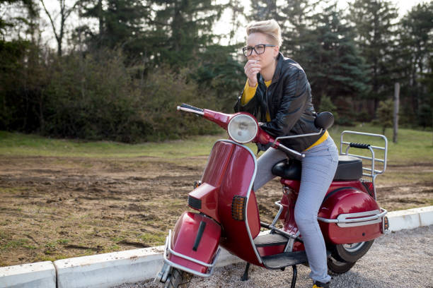 istock Urban girl on vespa 1439861329