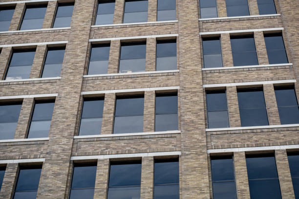 Free Stock Photo of Tall Brick Building With Lots of Windows | Download ...