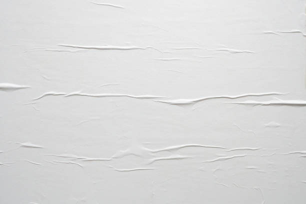 istock white crumpled and creased paper poster texture background 1439868813