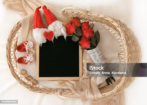 Mockup Of Letterboard Baby Shirt With Basket Social Media Pregnancy Letter Board Announcement Background With Blurred Selective Focus Stock Photo - Download Image Now