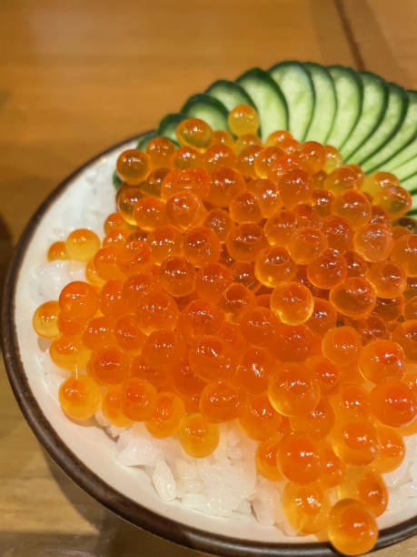 istock Salmon roe or salmon egg rice bowl. Japanese food. Background with copy space. 1439872571