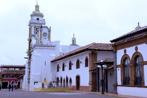 Plaza de Armas with a colorful wooden kiosk and the Parroquia de Santiago Apostol church, with its brightly colored facade, place to buy spheres for christmas