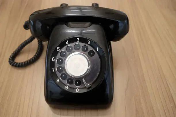 Old black retro rotary Telephone