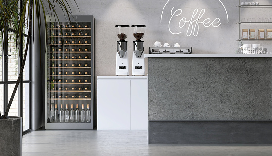 Modern and luxury design of concrete cafe counter, white cabinet with espresso maker, coffee grinder and drink refrigerator on cement floor