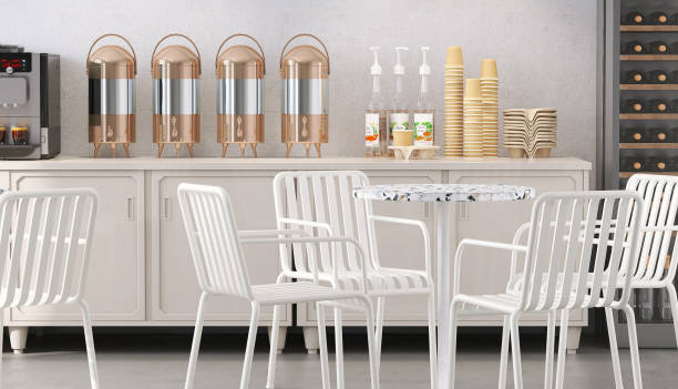istock White modern cafeteria with table, chairs and coffee counter and beverages refrigerator cooler in background 1439881377