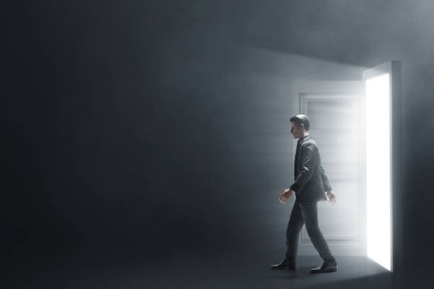 istock Business man entering dark room 3d illustration 1439893545