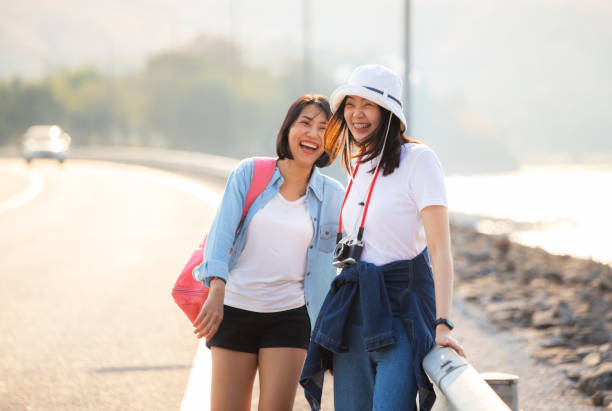 istock Young women having fun by the lake 1439894825