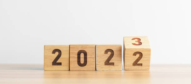 istock 2022 change to 2023 year block on table background. goal, Resolution, strategy, plan, start, budget, mission, action, motivation and New Year concepts 1439897621