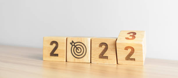istock 2022 change to 2023 Year block with dartboard icon. Goal, Target, Resolution, strategy, plan, Action, mission, motivation, and New Year start concepts 1439897628