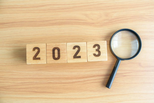istock 2023 block with magnifying glass. SEO, Search Engine Optimization, hiring , Advertising, Idea, Strategy, marketing, Keyword, Content and New Year start concepts 1439897686