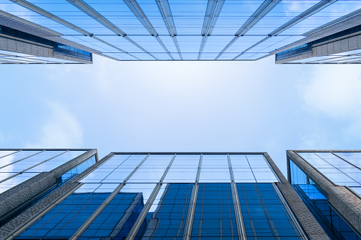 close up of Shanghai Financial District buildings and blue sky background