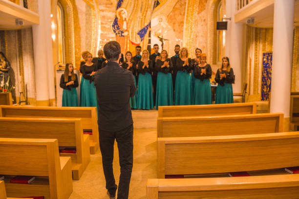 istock The choir is preparing for the performance with the conductor 1439902510