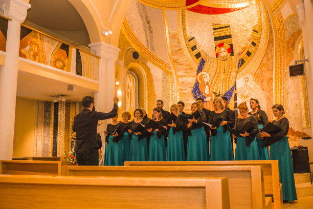 istock Choir practice with the musical conductor 1439904921