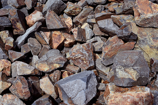 Pile of broken rocks in an abandoned rock mine near Bishop, CA in the Eastern Sierra