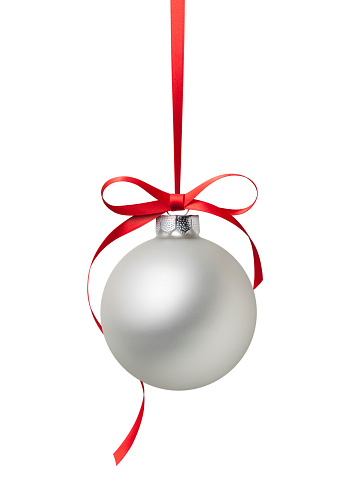 Silver Christmas ball with red bow isolated on white background.