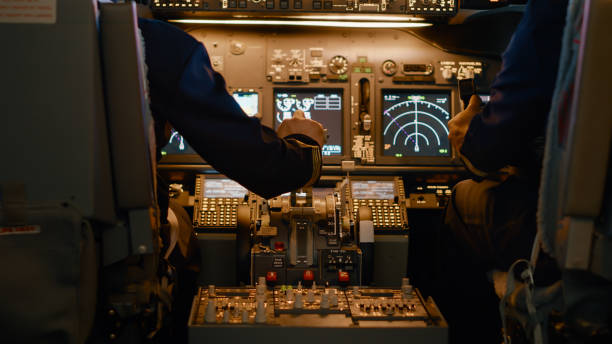 istock Airplane captain throttling engine to takeoff and fly plane 1439914251