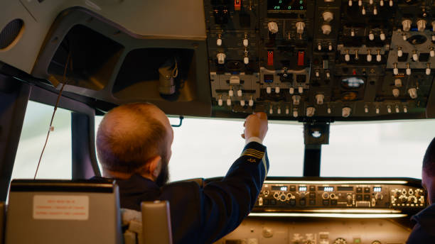 istock Flying aircrew preparing to takeoff with airplane in cockpit 1439914303