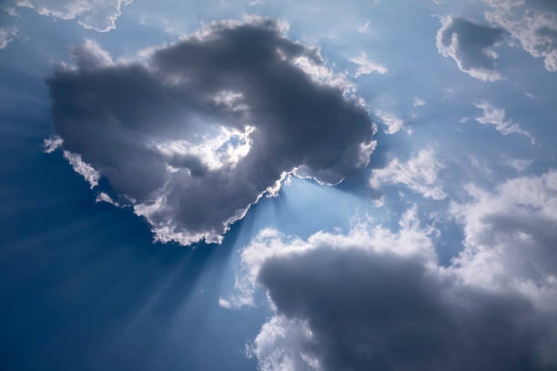 istock Beautiful cloudy and dramatic sky. Flying plane in sky 1439915758