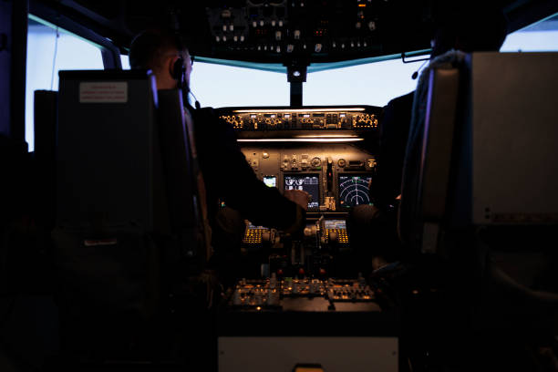 istock Diverse team of captain and pilot pushing engine throttle 1439917360