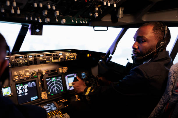 istock African american aviator flying plane jet in teamwork with captain 1439917431