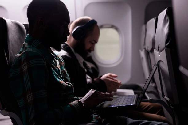 istock Multiethnic group of people travelling abroad by airplane 1439917466
