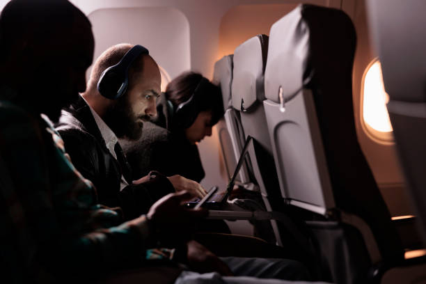 istock Group of passengers travelling on commercial flight by jet 1439918264