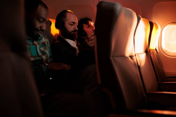 istock Group of passengers travelling to destination by airplane 1439918433